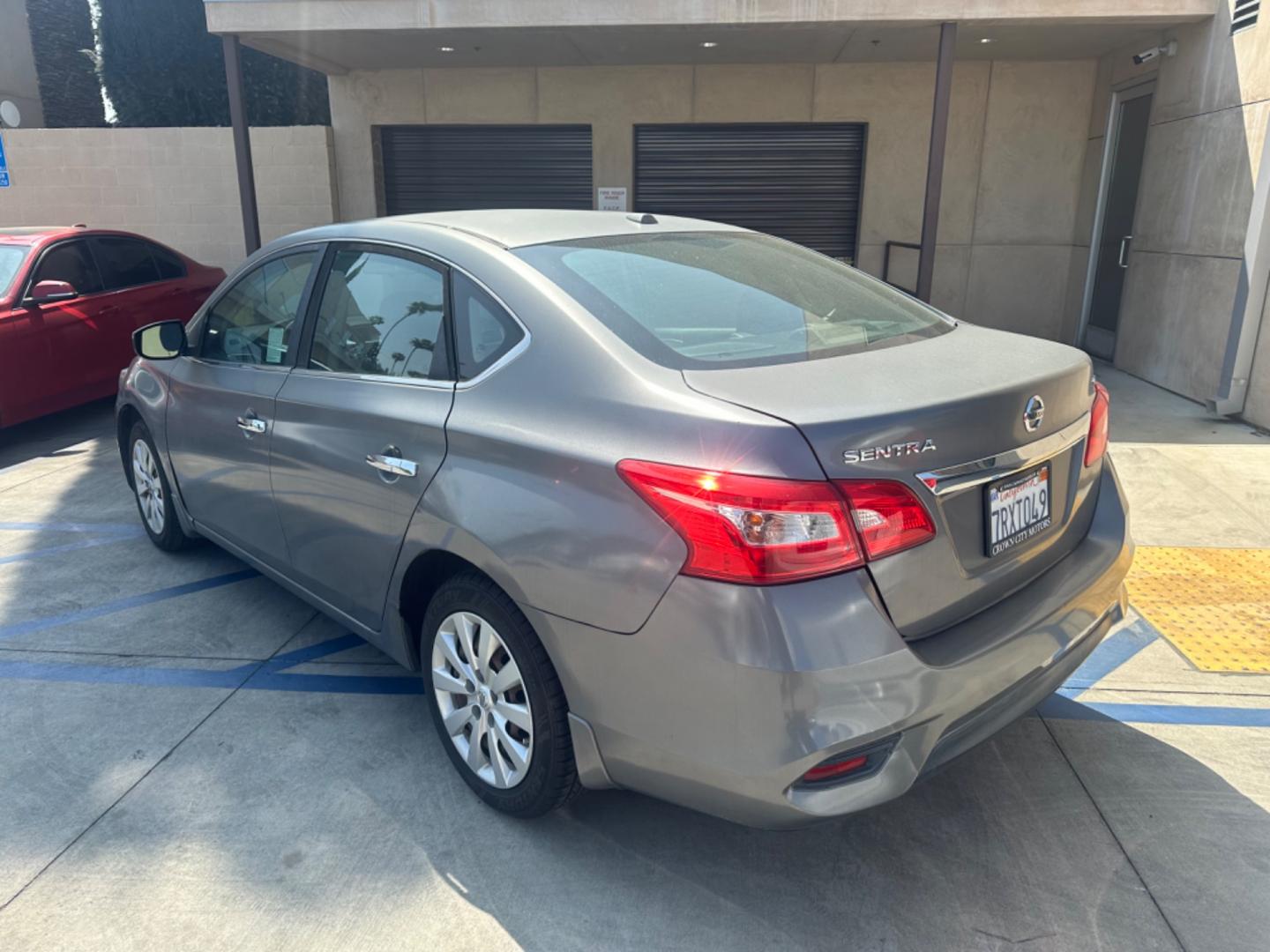 2016 Silver /Black Nissan Sentra FE+ S (3N1AB7AP7GY) with an 1.8L L4 SFI DOHC 16V engine, CVT transmission, located at 30 S. Berkeley Avenue, Pasadena, CA, 91107, (626) 248-7567, 34.145447, -118.109398 - Photo#2